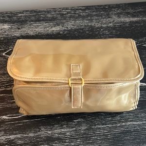 Elizabeth Arden gold travel jewelry and cosmetic bag
